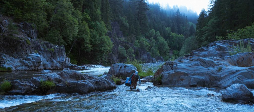 fisherman in the middle fork of the feather river