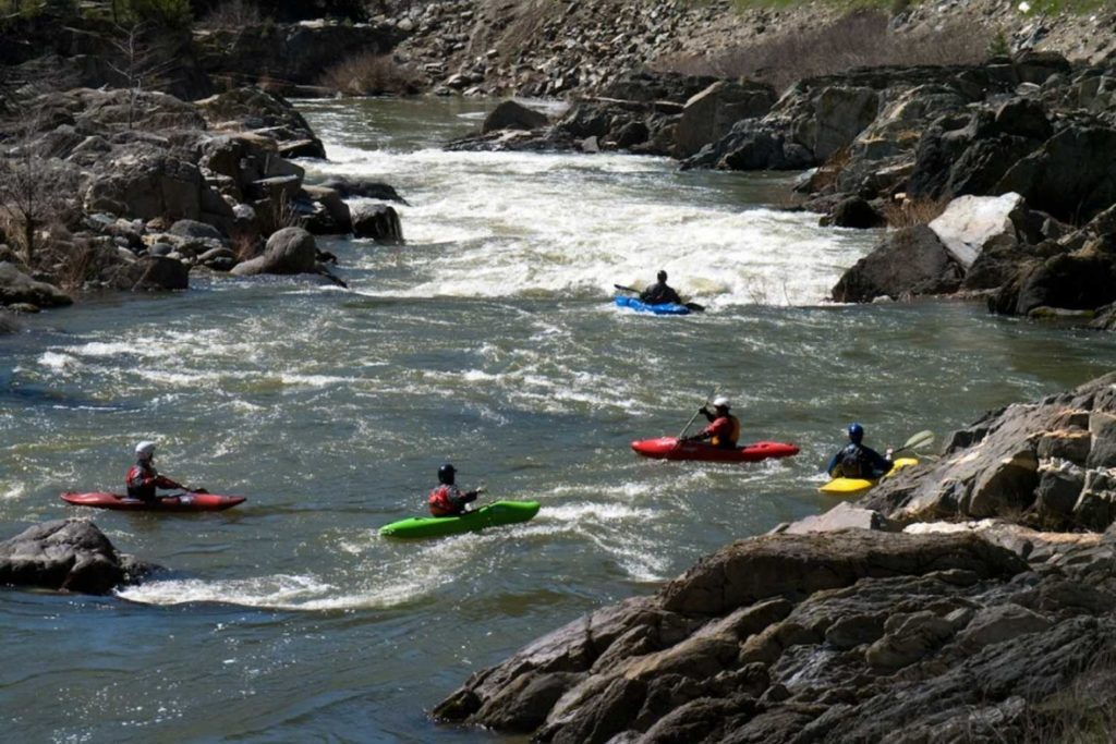 group of kayakers on the feather river in northern California