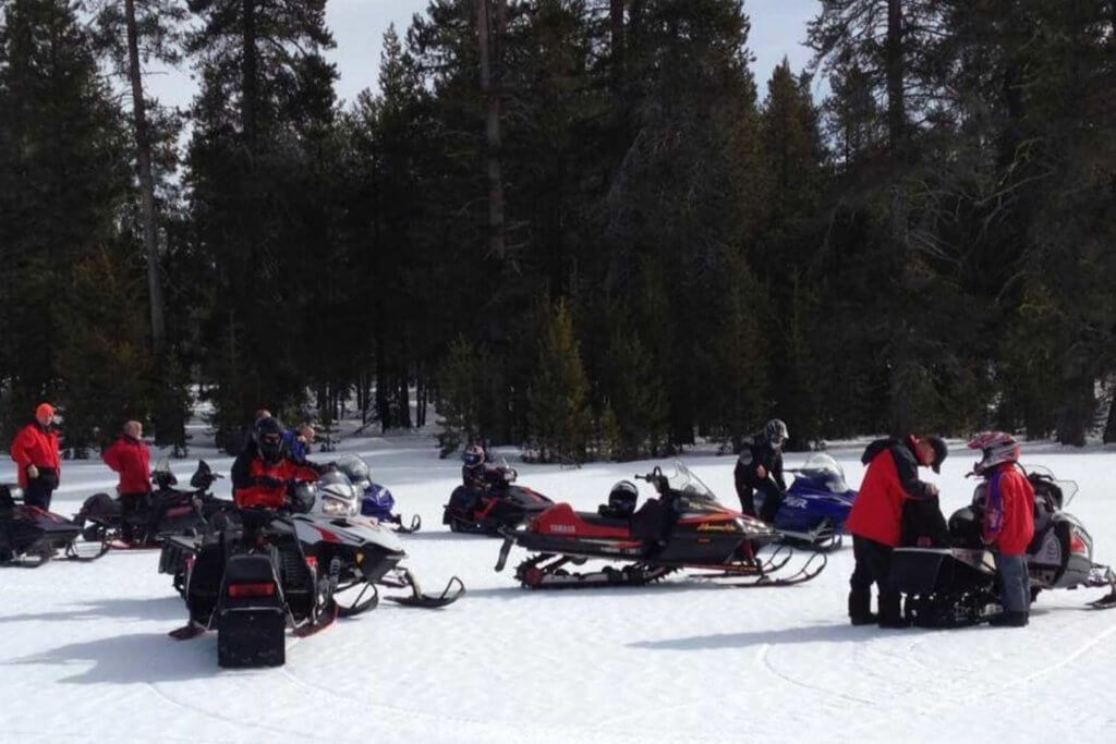 Snowmobiling Plumas County, group taking a break