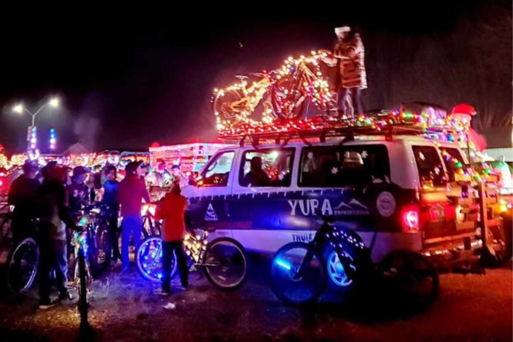 van covered in christmas lights