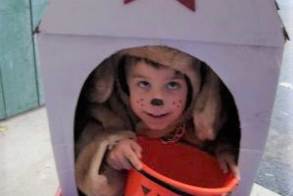 Boy in Hawollen costume with bucket. Chester, Ca