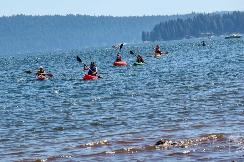 kayakers racing on lake almanor