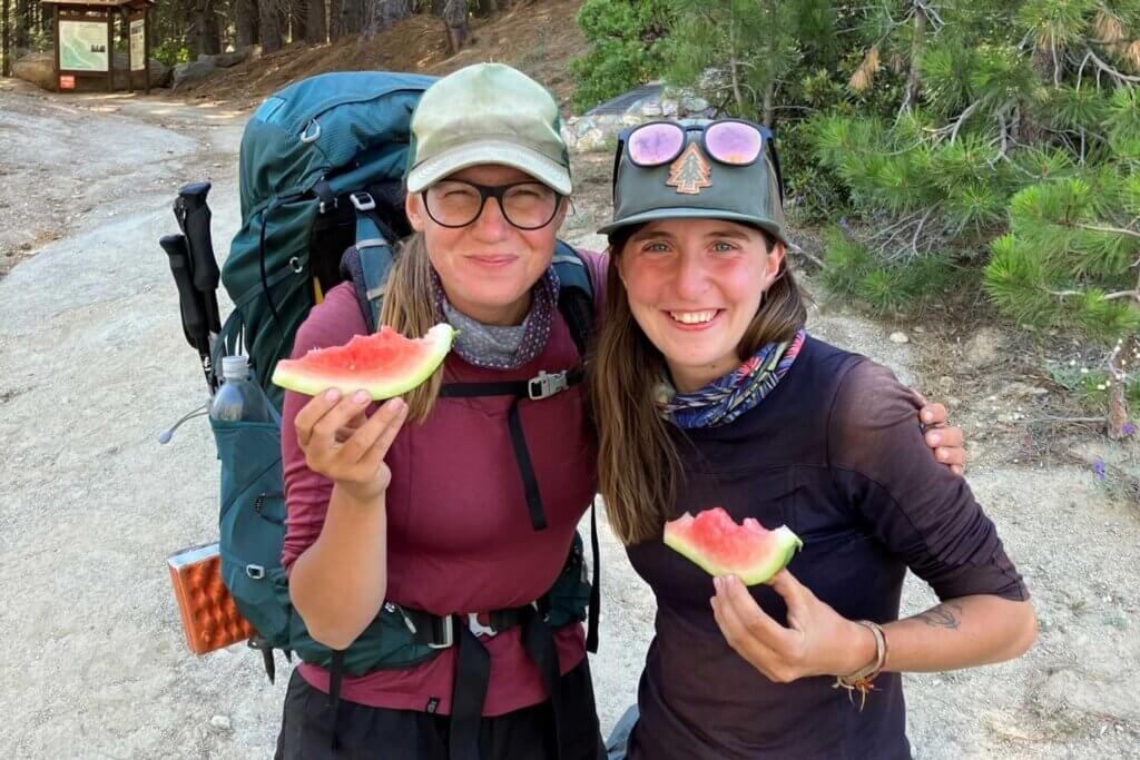 Pct hikers enjoying watermelon