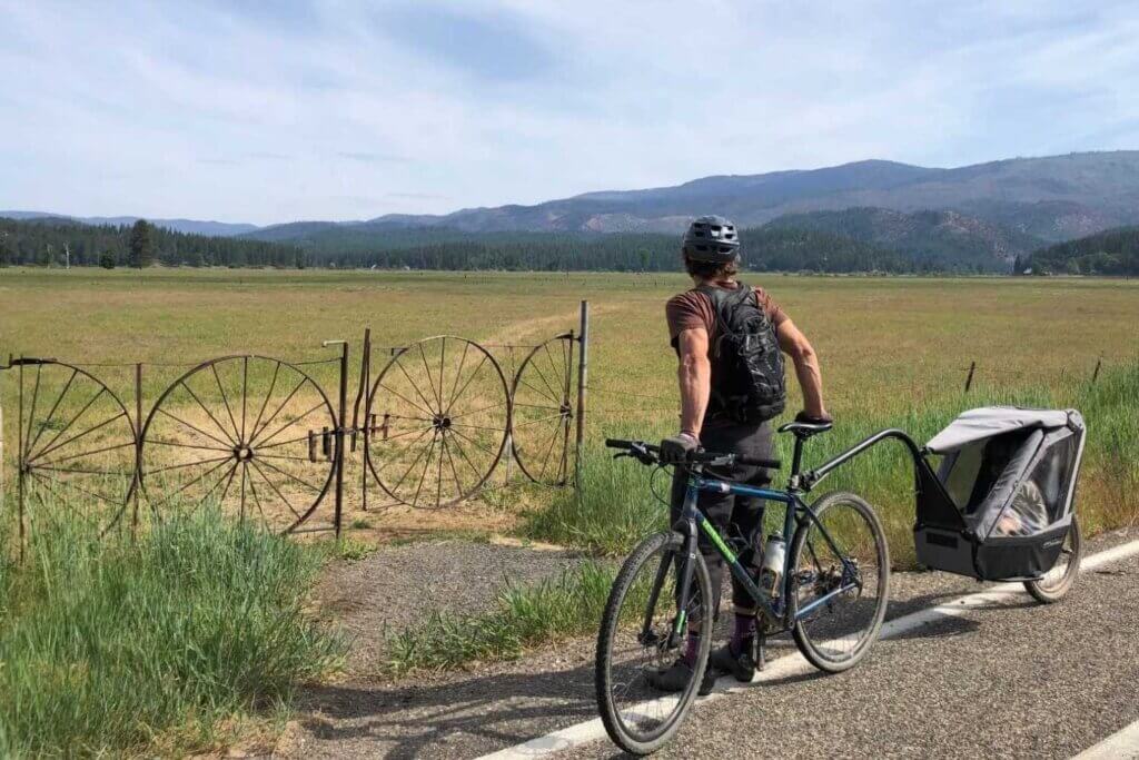 Cyclist with trailer in Quincy, California Enjoying view in American Valley