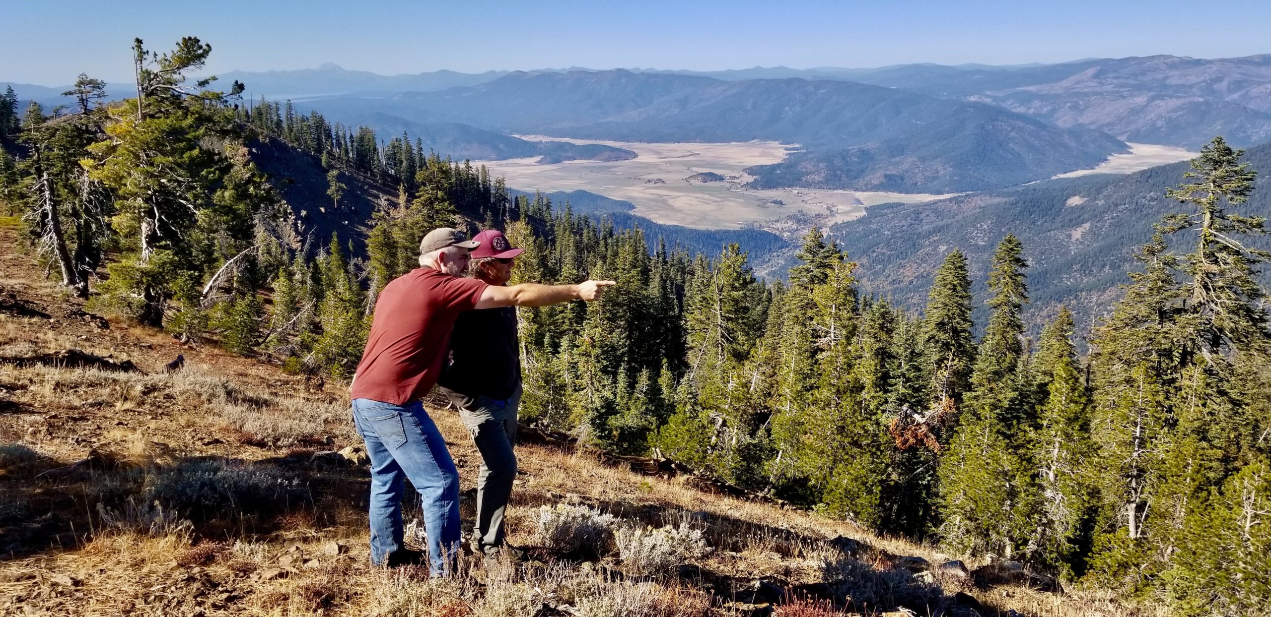 two men taking in the view from Grizzly Peak