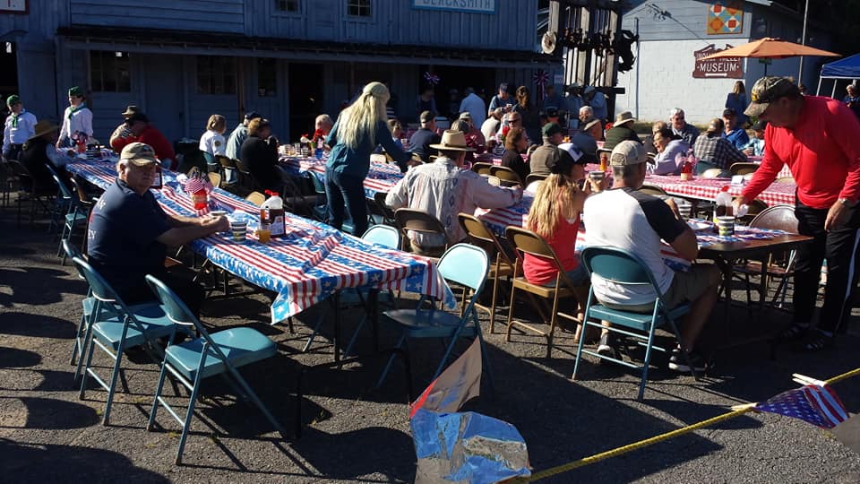 Tables and people at 4th of July Indian Valley Cowboy Breakfast