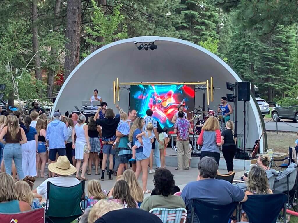 Lake Almanor Country Club Bandshell with band and group of people