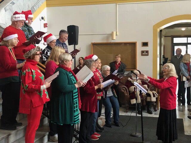Group of singers inside Plumas County Courthouse