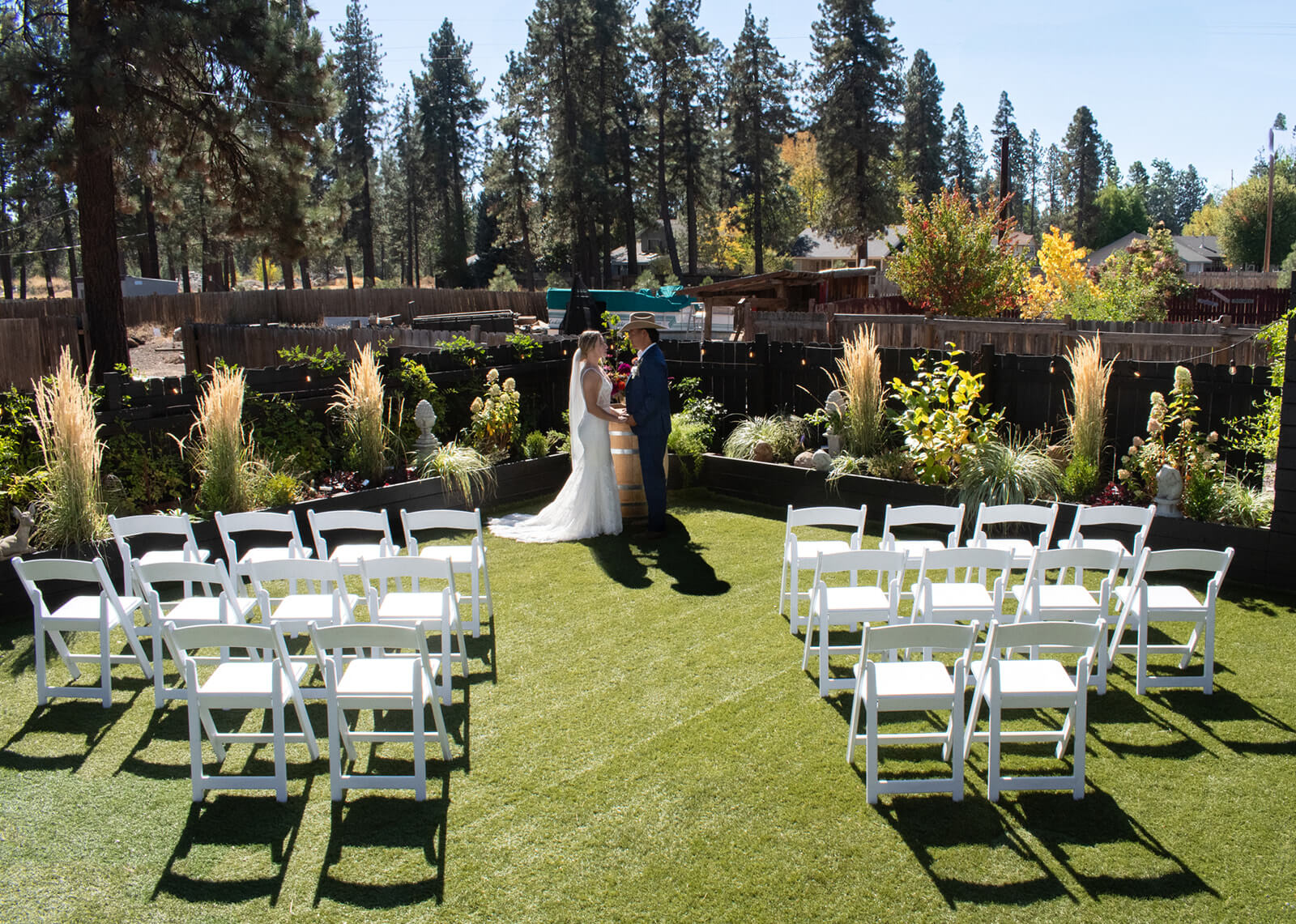 The elegant Farmer wedding area with chairs and couple standing in front